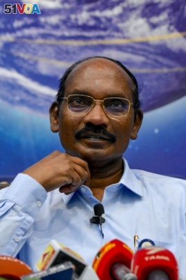Chairman of the Indian Space Research Organisation (ISRO) Kailasavadivoo Sivan gestures as he announces ISRO's plans for 2020.