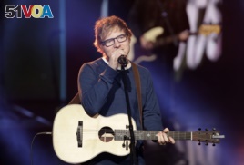 British singer Ed Sheeran performs during the Italian State RAI TV program 