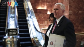 Vice President-elect Mike Pence and his wife Karen arrives at Trump Tower, Nov. 15, 2016, in New York.