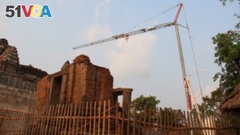 Parts of Phnom Bakheng temple in Cambodia's Siem Reap province are under construction as part of the conservation project.
