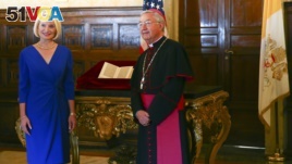 U.S. Ambassador Callista Gingrich, left, is photographed with Archbishop Jean-Louis Brugues on the occasion of the presentation to the Vatican of an authentic 15th Century copy of a letter written by Christopher Columbus.