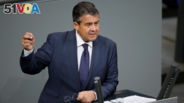 FILE - German Foreign Minister Sigmar Gabriel speaks during a session of the Bundestag, Germany's lower house of Parliament, in Berlin, Germany, Nov. 21, 2017.