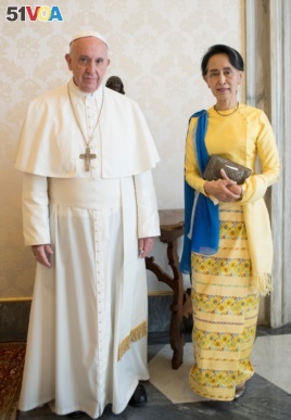 Aung San Suu Kyi met Pope Francis at the Vatican in May.