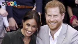 FILE - In this file photo dated Wednesday Oct. 3, 2018, Meghan, Duchess of Sussex and Britain's Prince Harry, make an official visit to the Joff Youth Centre in Peacehaven, Britain. Kensington Palace announced Monday Oct. 15, 2018, that Prince Harry and 
