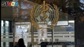 FILE - A logo is pictured on the World Health Organization (WHO) headquarters in Geneva, Switzerland on November 22, 2017. (REUTERS/Denis Balibouse/File Photo)