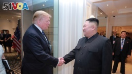 North Korea's leader Kim Jong Un shakes hands with U.S. President Donald Trump during the second North Korea-U.S. summit in Hanoi, in this photo released on March 1, 2019, by North Korea's Korean Central News Agency.