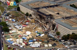 The Pentagon attack site is shown Friday, Sept. 14, 2001, after a plane slammed into the building on Tuesdady, Sept. 11. The terrorist attack caused extensive damage to the west face of the building. (AP Photo/Tech. Sgt. Cedric H. Rudisill)