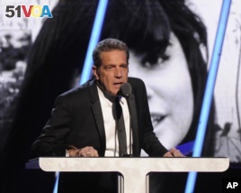 FILE - Glenn Frey speaks at the 2014 Rock and Roll Hall of Fame Induction Ceremony in New York, April, 10, 2014.