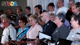 The Hungarian choir Breathing for the Soul helps people breathe easier. (Reuters/Bernadett Szabo)
