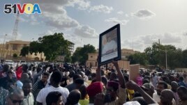Supporters of Nigerien President Mohamed Bazoum gather to show their support for him in Niamey on July 26, 2023. (Photo by AFP)