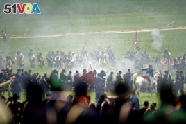Actors reenact Pickett's Charge during the 150th anniversary of the Battle of Gettysburg.