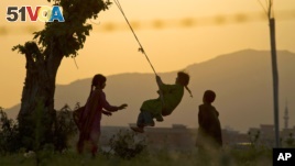 Pakistani children play on the outskirts of Islamabad, Pakistan in 2013 file photo. (AP Photo/Anjum Naveed)