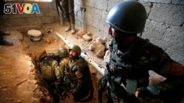 Peshmerga forces inspect a tunnel used by Islamic State militants in the town of Bashiqa. (File)