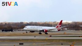  Virgin Atlantic's Flight100 Lands at JFK Airport in New York City from London Heathrow, Tuesday, Nov. 28, 2023 in New York. (Jason DeCrow/AP Images for Virgin Atlantic Airways Ltd)