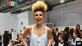 Model Tallia Storm at London Fashion Week shows off bleached, treated and teased up hair. (Photo by: KGC-42/STAR MAX/IPx, September 18, 2015)