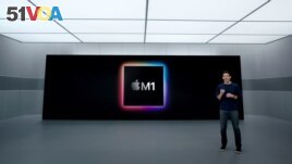 Apple's senior vice president of Hardware Engineering John Ternus talks about the M1 processor used in iPad Pro and iMac, in this still image from the keynote video of a special event at Apple Park in Cupertino, California, U.S. released April 20, 2021. A