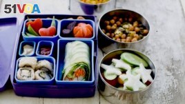 This July 9, 2012 photo shows a Japanese bento box and Indian Tiffin. They give students a multinational type school lunch in Concord, New Hampshire. (AP/Matthew Mead, file photo)