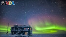 FILE - A NOAA photo shows aurora australis near the South Pole Atmospheric Research Observatory in Antarctica. When a hole in the ozone formed over Antarctica, countries around the world in 1987 agreed to phase out several ozone-depleting chemicals. (AP Photo)