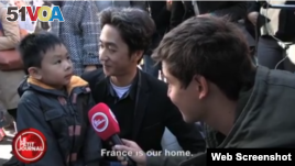 Young Brandon and his father, Angel Le, talk about the Paris attacks with Le Petit Journal.