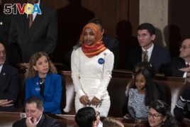 Rep. Ilhan Omar, a freshman Democrat representing Minnesota's 5th Congressional District, votes for Nancy Pelosi to be speaker of the House of Representatives on the first day of the 116th Congress, at the Capitol in Washington, Thursday, Jan. 3, 2019. (A