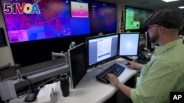 A specialist works at the National Cybersecurity and Communications Integration Center in Arlington, Virginia.