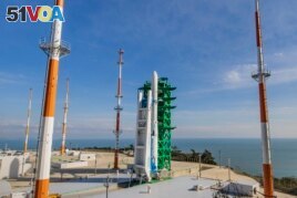 The Nuri rocket, the first domestically produced space rocket, sits on its launch pad at the Naro Space Center in Goheung, South Korea, Thursday, Oct. 21, 2021. (Korea Pool via AP)