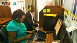 Dr. Yvette Wibabara and Pharmacist Joseph Ssebwana are working at the call center, using multiple social media platforms to answer health questions.