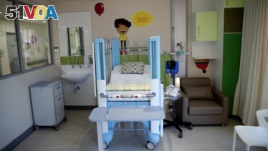 A pediatric hospital bed is seen at a ward during the official opening of the Nelson Mandela Children's Hospital in Johannesburg, South Africa, Dec. 2, 2016.