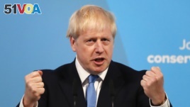 Boris Johnson speaks after being announced as the new leader of the Conservative Party in London, Tuesday, July 23, 2019. (AP Photo/Frank Augstein)