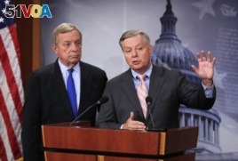 Senator Lindsey Graham, R-South Carlina, right, with Sen. Dick Durbin, D-Illinois, speaks during a news conference on September 5, 2017.