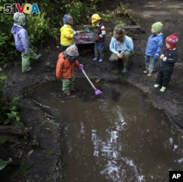 Cedarsong Nature School is an outdoor preschool on Vashon Island near Seattle, Washington. Students at the three-hour-a-day school spend the entire time outside, no matter what the weather brings. (AP Photo/Ted S. Warren, 2010)