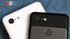 The cameras on the back of the Google Pixel 3 XL, left, and Google Pixel 3 smartphones are shown in this photo, in New York, Wednesday, Oct. 10, 2018. (AP Photo/Richard Drew)