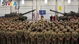 British Defense Secretary Gavin Williamson visits United Kingdom troops of the NATO Enhanced Forward Presence battle group at the military base in Tapa, Estonia, March 25, 2018.