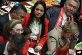 Ruling party lawmakers react after the lower house of Congress voted to impeach Brazil's President Dilma Rousseff in the Chamber of Deputies in Brasilia, Brazil, April 17, 2016.  