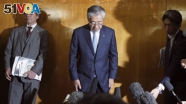 International Olympics Committee member and head of the Japanese Olympic Committee Tsunekazu Takeda bows as he speaks after a JOC executive board meeting in Tokyo Tuesday, March 19, 2019. Takeda is resigning amid a bribery scandal. (AP Photo/Eugene Hoshiko)