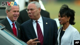 Former President George W. Bush arrives at Shannon Airport in western Ireland with Colin Powell, who was then his secretary of state, and Condoleeza Rice, who was his national security adviser, June 25, 2004. Rice later became secretary of state.