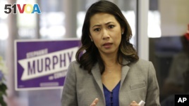 In this photo taken Oct. 18, 2016, Florida Democratic Congressional candidate Stephanie Murphy meets with voters at a senior center in Altamonte Springs, Florida. Murphy went on to become the first Vietnamese-American woman to be elected to Congress. 