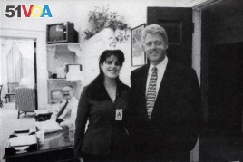 FILE - Official White House photo from Independent Counsel Kenneth Starr's report on Clinton, showing the president and Monica Lewinsky at the White House in 1995.