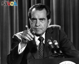 FILE - In this March 15, 1973, file photo President Nixon tells a White House news conference that he will not allow his legal counsel, John Dean, to testify on Capitol Hill in the Watergate investigation.