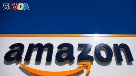 In this April 16, 2020, file photo, the Amazon logo is shown in Douai, northern France. The deal, proposed by President Biden, aims to collect taxes from international companies like Amazon that use online business to avoid taxes since they may not have an actual physical presence. Large international companies like Amazon also move profits to tax havens. (AP Photo/Michel Spingler, File)