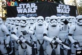 Stormtrooper action figures are seen as a part of an installation at The Americana at Brand for the opening of Star Wars: The Force Awakens, in Glendale, Calif., Dec. 17. (Photo by Danny Moloshok/Invision for JAKKS/AP Images)      