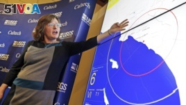 In this Jan. 28, 2013 file photo, seismologist Dr. Lucy Jones describes how an early warning system would provide advance warning of an earthquake, at a news conference at the California Institute of Technology in Pasadena, Calif. (AP Photo/Reed Saxon)