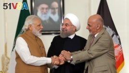 Afghanistan president and India prime minister shake hand with Rouhani, Iran president, May 2016.
