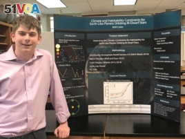 Wolf Cukier with his high school science project in June 2019. He discovered a new planet on his third day at a NASA internship.