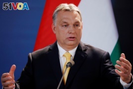 Hungarian Prime Minister Viktor Orban speaks during a press conference in Budapest, Hungary, April 10, 2018.