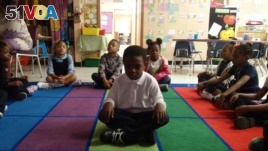 Students take part in the Mindful Moment Program in Baltimore, Maryland.