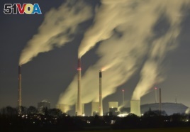 In this Nov. 24, 2014 file photo, smoke streams from the chimneys of the E.ON coal-fired power station in Gelsenkirchen, Germany. (AP File)