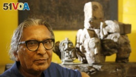 India's Balkrishna Doshi who won the 2018 Pritzker Architecture Prize sits for a photo at his home in Ahmadabad, India, Wednesday, March 7, 2018. (AP Photo/Ajit Solanki)