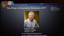 A photo of Richard H. Thaler, winner of the Nobel Prize in economic sciences 2017, officially called the Sveriges Riksbank Prize in Economic Sciences in Memory of Alfred Nobel, is seen during a press conference in Stockholm, Oct. 9, 2017. 