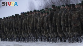 German Bundeswehr soldiers of the 122th Infantry Battalion take part in a farewell ceremony in Oberviechtach, Germany, Thursday, Jan. 19, 2017. As a part of the NATO program 'enhanced forward presence' 450 soldiers will move to Lithuania in the upcoming w
